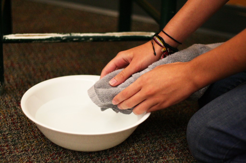 Instead of the typical hazing, Bryan freshmen experience initiation where the seniors wash the their feet. [Triangle photo by Lana Douglas]