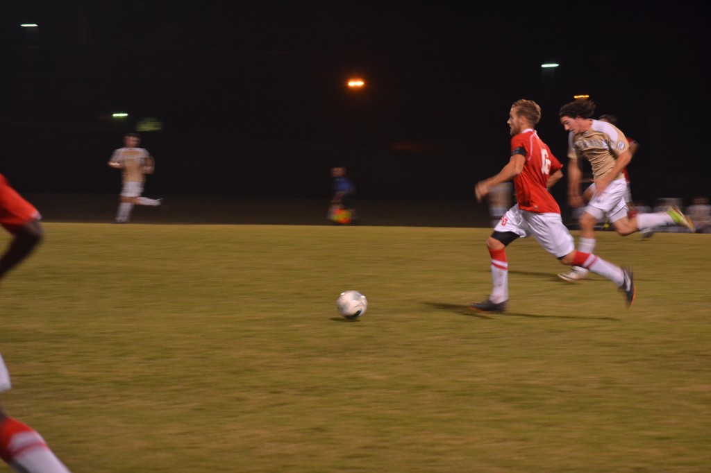 Stephen Millage passes during the Nov. 16 game / Photo by Kat Frazier
