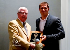 Coach Taylor Hasty receives his award from Pat Swallows, Executive Director of TBCA/ Photo credit tbca.org
