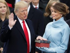 Donal Trump being sworn in.
